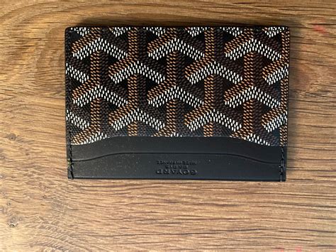 goyard card holder retail price.